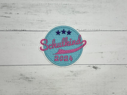 Schulkind 2025 türkis/pink/lila